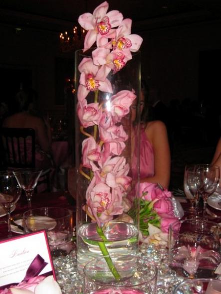 These centerpieces were made with a tall vase filled with a large stem of