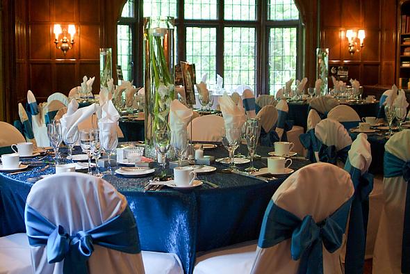 White centerpieces with blue linens I wasn't really sure how the blue 