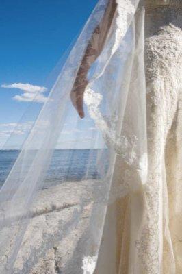 Mrs. Bluebell's flat mantilla cathedral length veil from Sposabella Lace in NYC