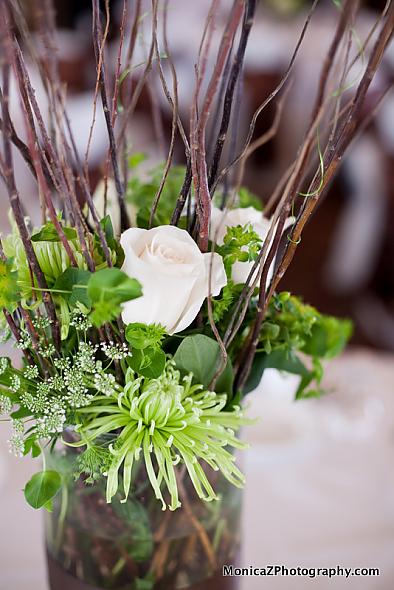 willow branch centerpiece green and ivory flowers made by Bella Flora 