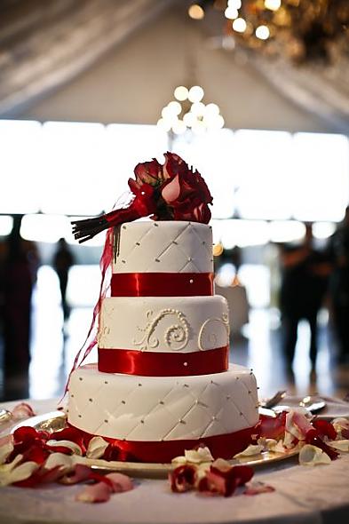 red/white cake with toss bouquet
