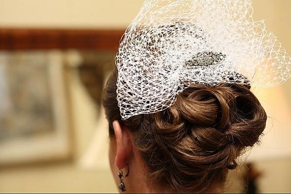 Bridal Updo vintage broach turned hair comb bird cage veil turned poof