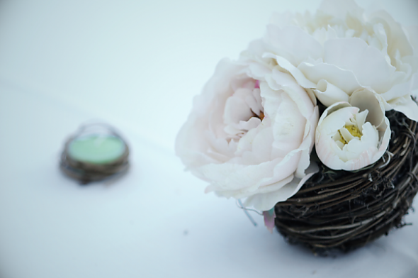 Peonies in a twisted fern nest
