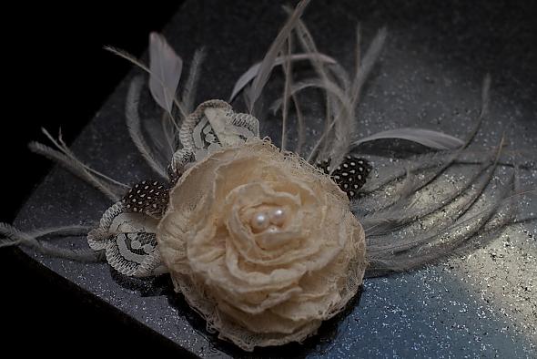 Frayed flower and feather hair flowe