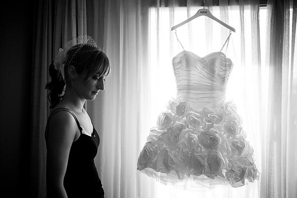 Getting ready to put on the dress