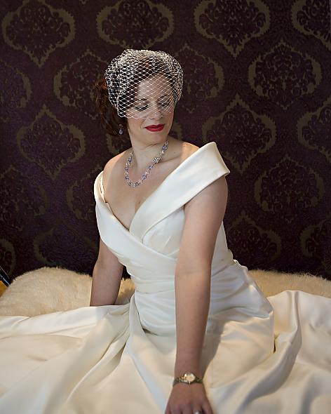 Silver birdcage veil with antique pe