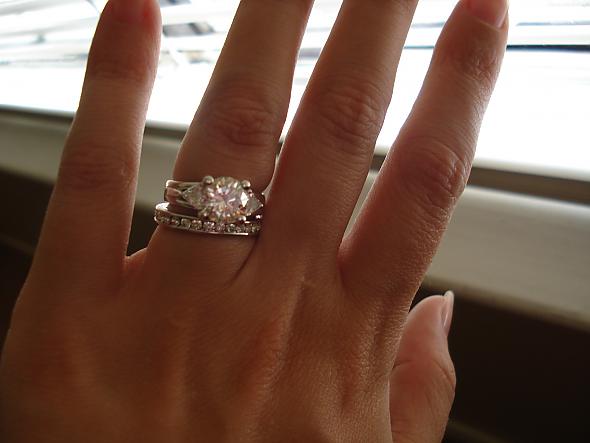 My 3 carat engagement ring along with my 1 carat eternity band